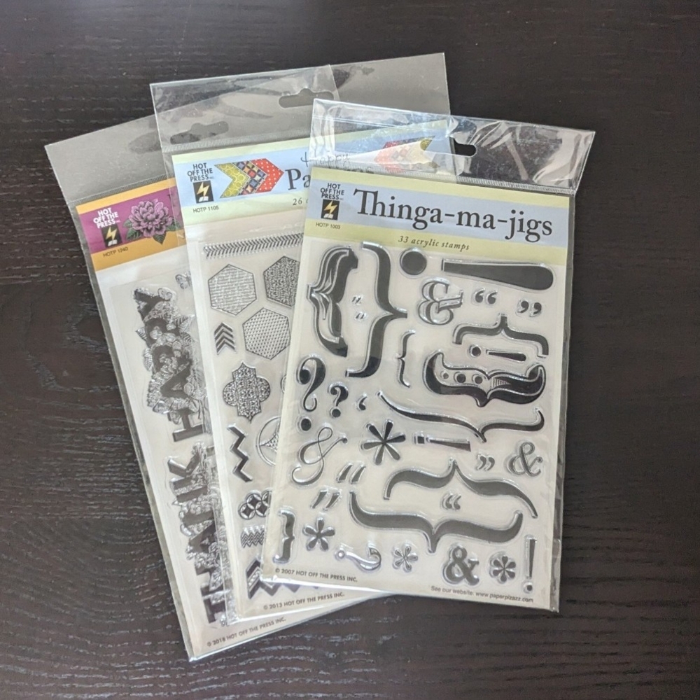 Hot Off the Press set of three cling stamp sets, over 70 stamps